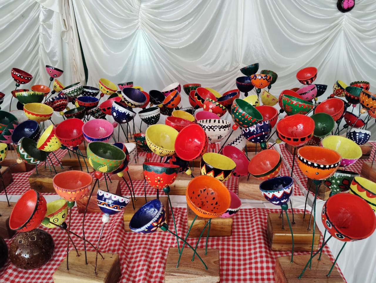 Display of value added coconut shells artefacts made by the GSDP trainees during the valedictory fun